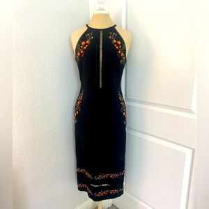 Gianni Bini black dress with floral detail in size medium